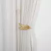 Winged Brass Curtain Holder